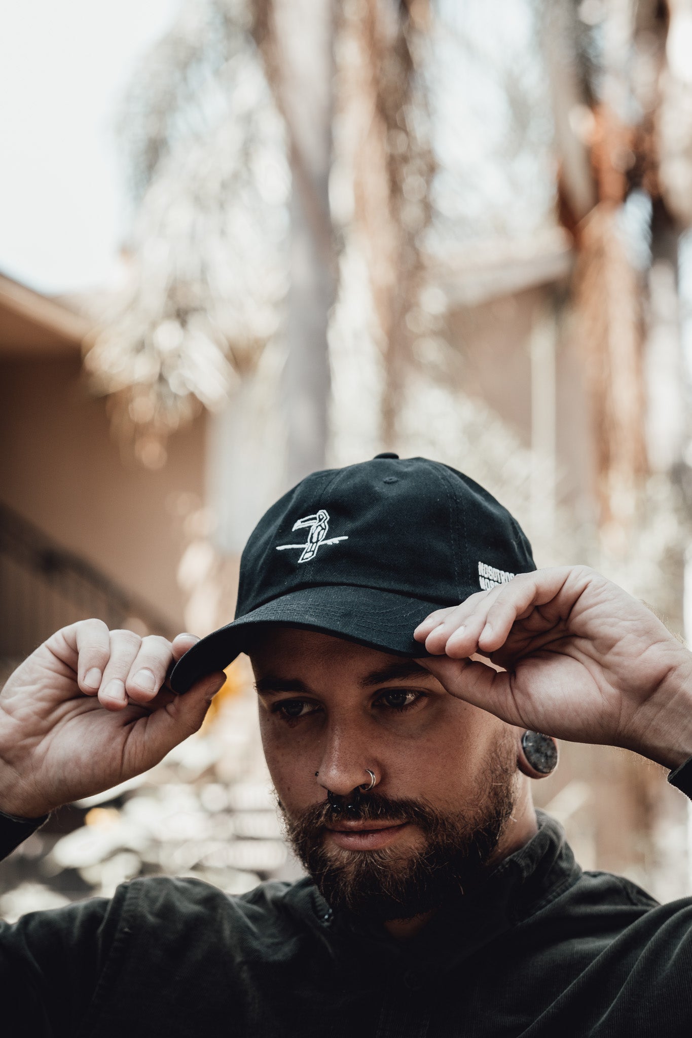 The Nosotros Toucan Dad Cap - Black or Tan